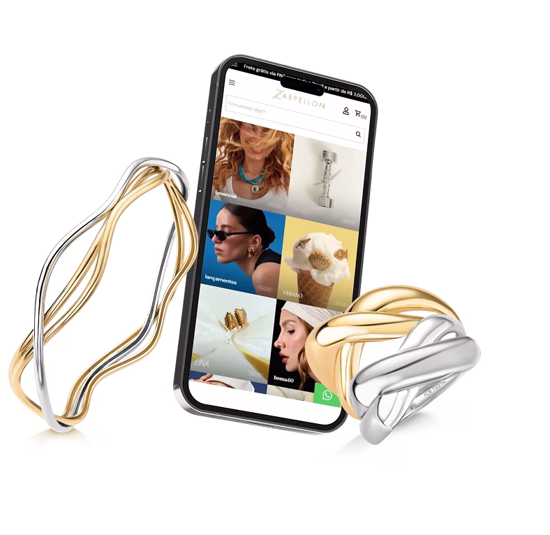 Mockup do e-commerce de joias Zarpellon Joias exibido em celular, mostrando vitrine com colares, brincos e anel banhado a ouro.
